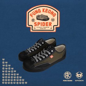 A pair of FK (band) SPIDER with black and white striped shoe laces.